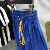 Front view of Rhude luxury clothing with streetwear-inspired cut