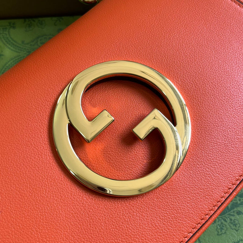 Styled lifestyle shot of sleek signature women's handbag – women's luxury accessory