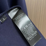 Side profile view of Balmain luxury piece style No.049