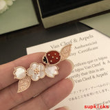 Full view of Van Cleef & Arpels unisex jewelry piece