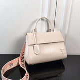 Front view of everyday-luxe refined women's handbag – women's designer-style accessory