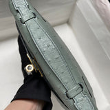 Side view of modernist structured handbag