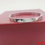 Lifestyle view of Cartier unisex jewelry piece