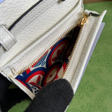 Handle and strap detail of polished statement women's handbag – women's statement bag