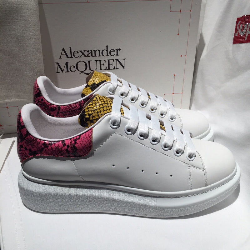 Alexander McQueen fresh white-and-black luxury sneakers view 7 signature lace-up style