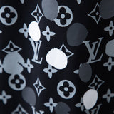 Flat lay presentation of Louis Vuitton luxury clothing with streetwear-inspired cut