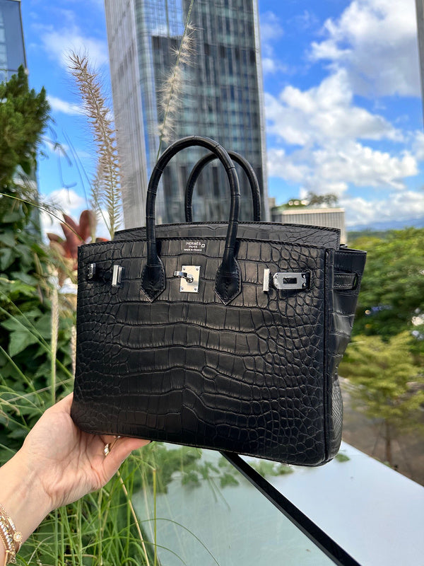 Close-up detail of sculpted bag design