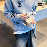 Back view of Louis Vuitton luxury clothing with monogram-inspired silhouette
