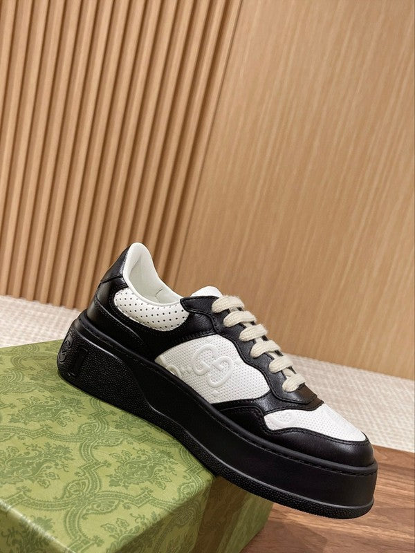 Gucci Fashion sneakers in soft grey chunky sole construction front view