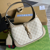 Handle and strap detail of polished structured women's handbag – women's statement bag
