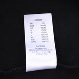 Back view of Louis Vuitton luxury clothing with everyday silhouette