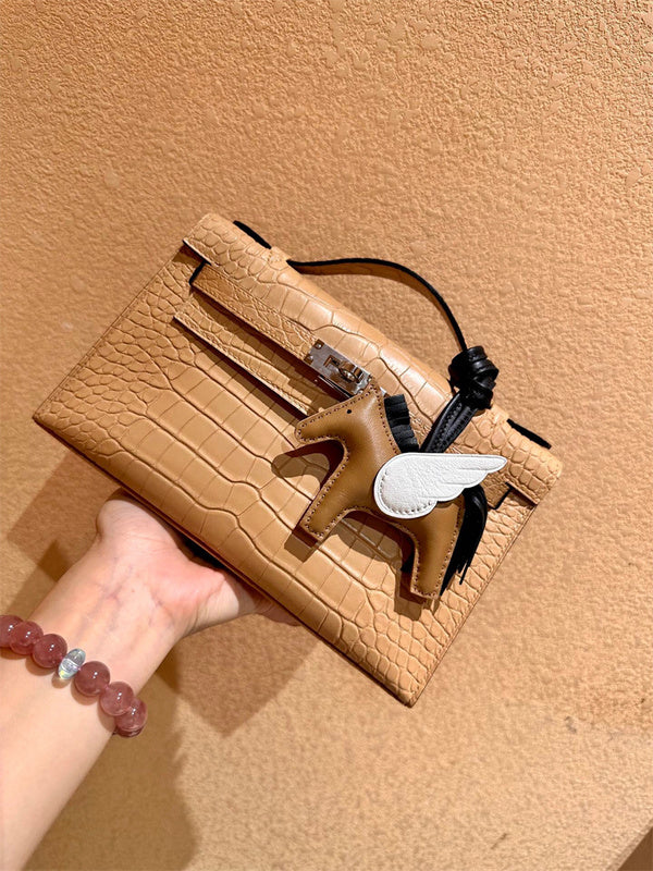  Curated handbag carried on shoulder 10
