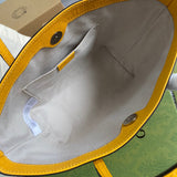 Side profile of chic classic women's handbag – women's luxury accessory