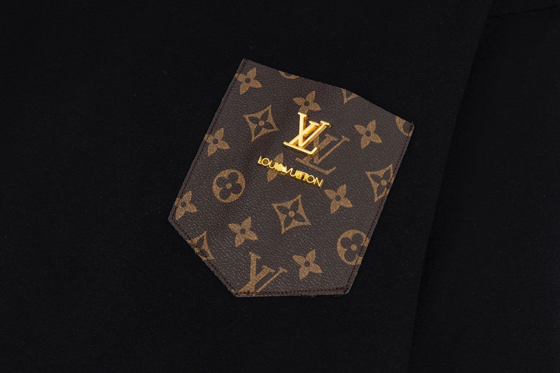 Front view of Louis Vuitton luxury clothing with label-forward styling
