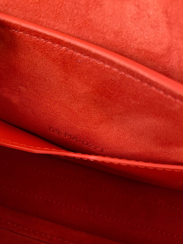 Top view of statement sleek women's handbag – women's designer-style accessory