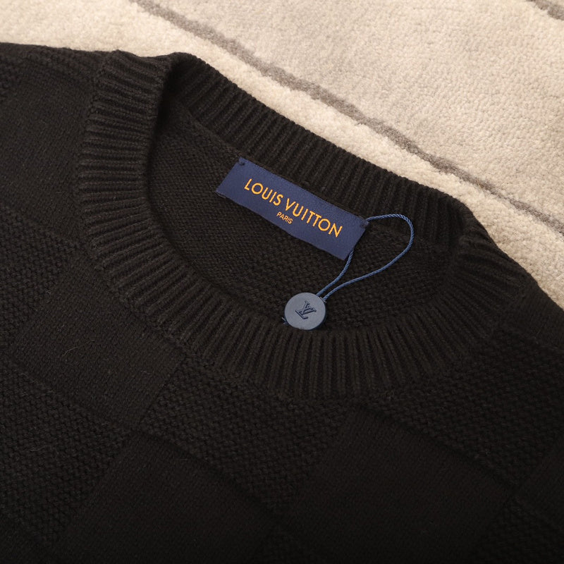 Front view of Louis Vuitton luxury clothing with logo-detail design