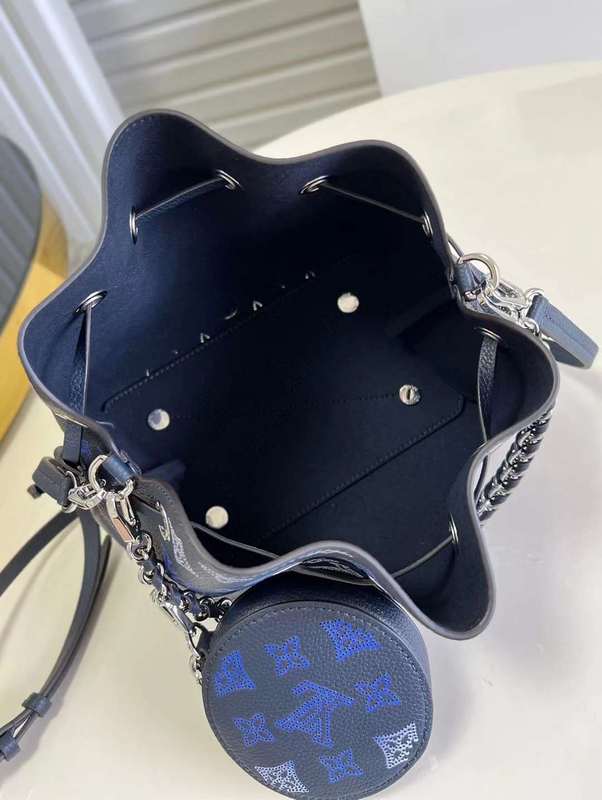 Handle and strap detail of everyday-luxe polished women's handbag – women's designer-style accessory