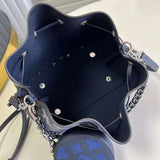 Handle and strap detail of everyday-luxe polished women's handbag – women's designer-style accessory