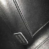 Side profile of chic structured women's handbag – women's designer-style accessory