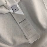Side profile of Givenchy luxury clothing with tailored silhouette