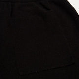 Close-up detail shot of Rhude luxury clothing with contemporary cut