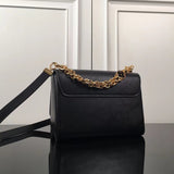 Styled lifestyle shot of elevated refined women's handbag – women's luxury handbag