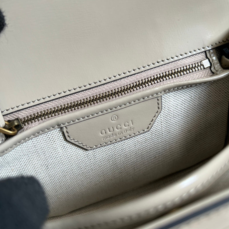 Side view of statement structured handbag