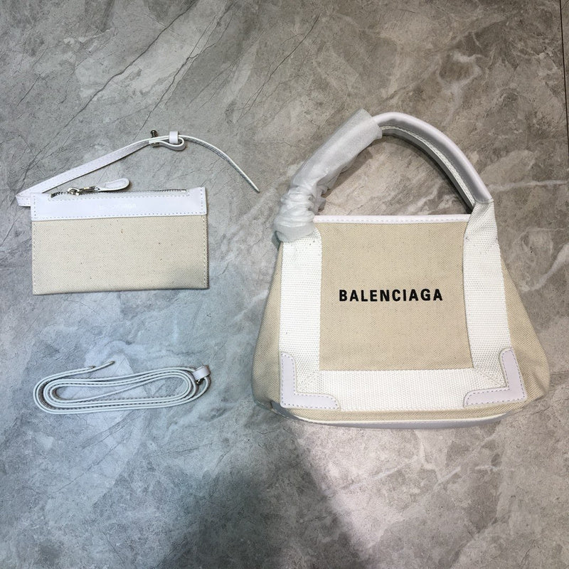 Statement Premium PU Leather Handbag - Smooth Faux-Leather Exterior | Women's Luxury Handbag #779 - side angle view (image 2) of designer-inspired handbag