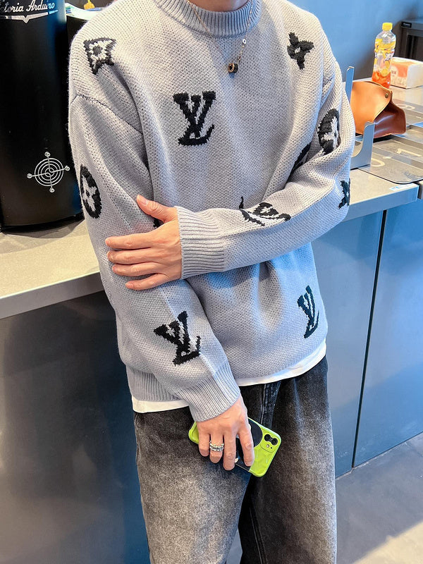 Close-up detail shot of Louis Vuitton luxury clothing with monogram-inspired silhouette
