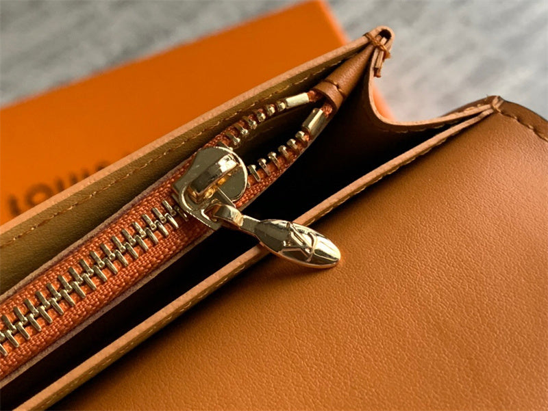  Sleek crossbody bag carried on shoulder 16