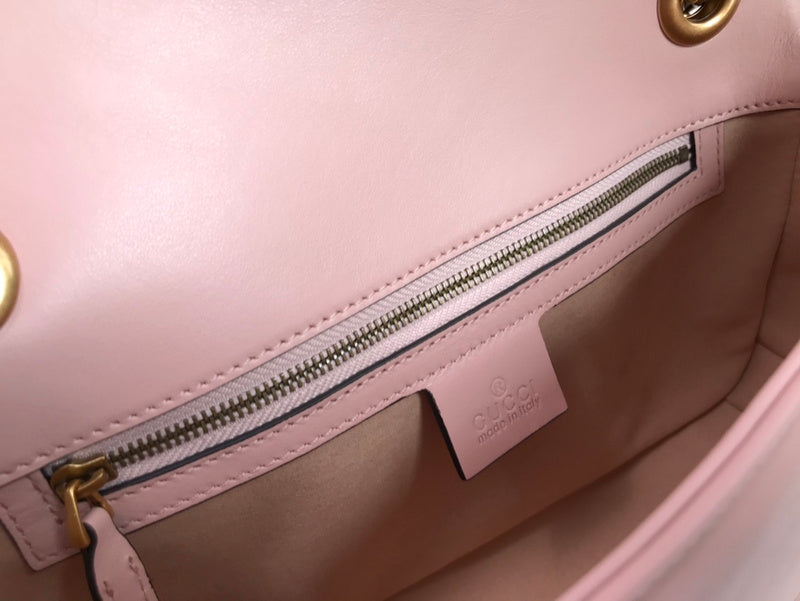 Side profile of polished signature women's handbag – women's statement bag