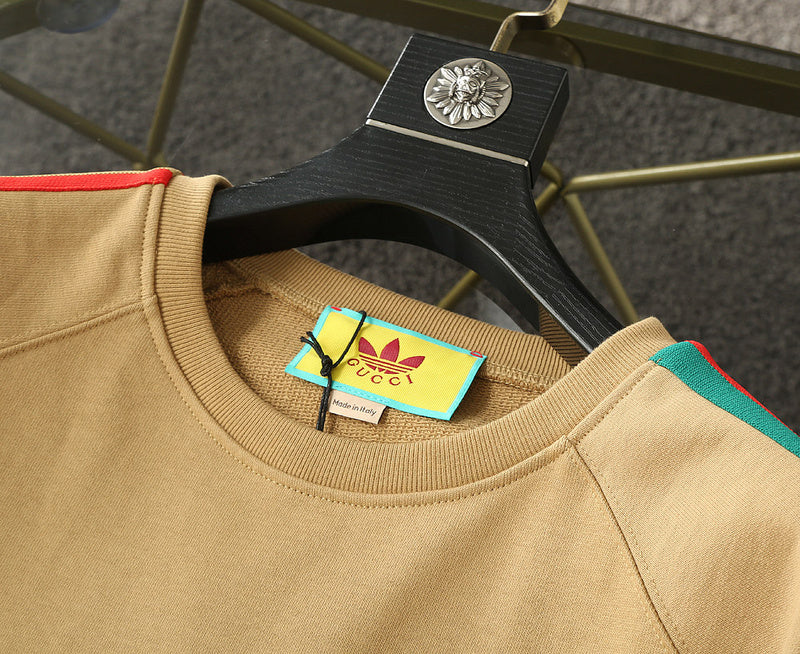 Full styled look of Gucci luxury clothing with signature branding