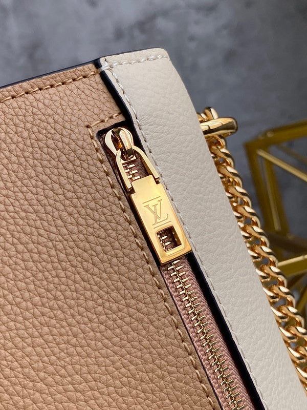 Back view of refined structured women's handbag – women's luxury accessory