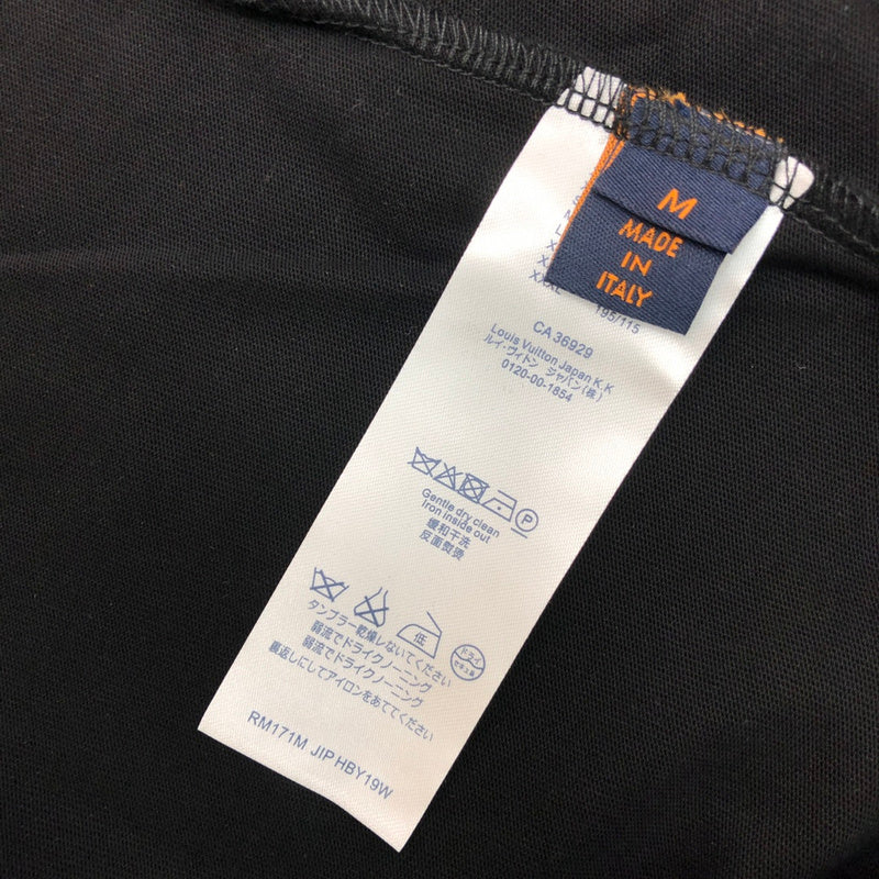 Flat lay presentation of Louis Vuitton cotton t-shirt with monogram-inspired silhouette