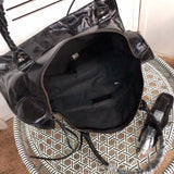 Interior view of polished elevated women's handbag – women's statement bag