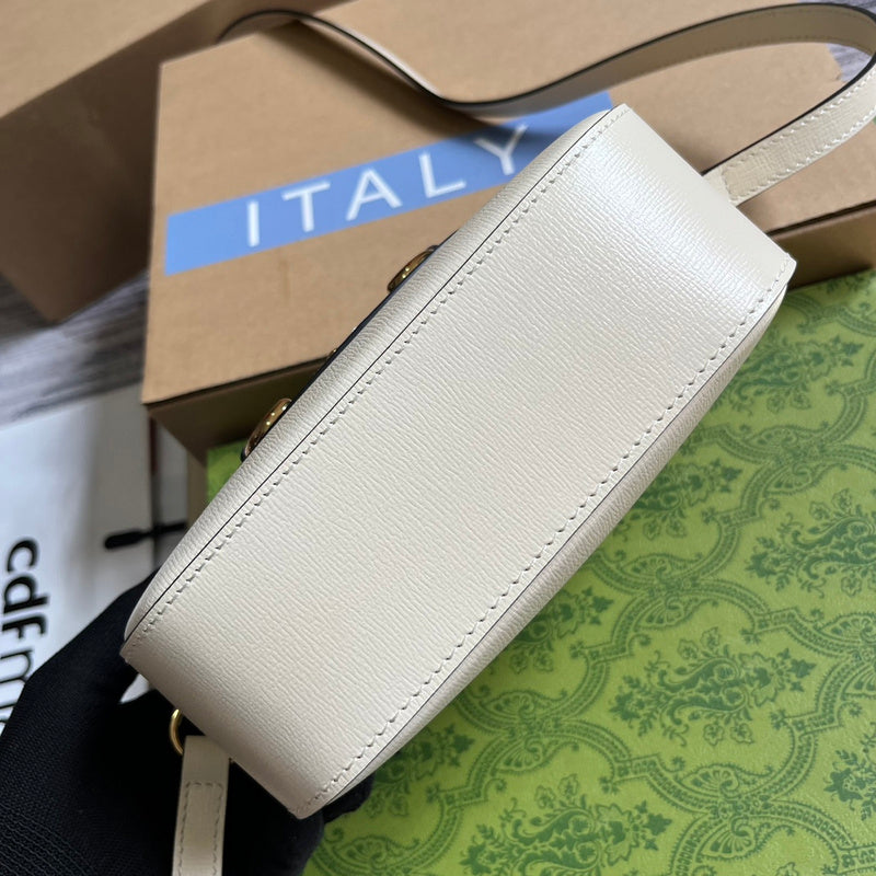 Styled lifestyle shot of elevated chic women's handbag – women's luxury accessory