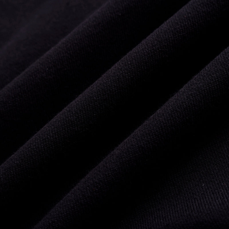 Side profile of Louis Vuitton luxury clothing with label-forward styling
