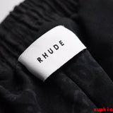 Side profile of Rhude luxury clothing with everyday silhouette