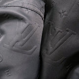 Close-up detail shot of Louis Vuitton luxury clothing with relaxed-fit cut