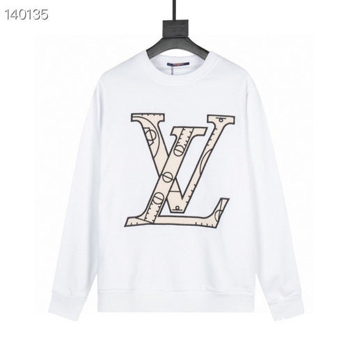 Close-up detail shot of Louis Vuitton luxury clothing with label-forward styling