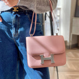 Side view of streamlined structured handbag