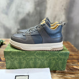 Gucci Fashion sneakers in soft grey classic court silhouette front view