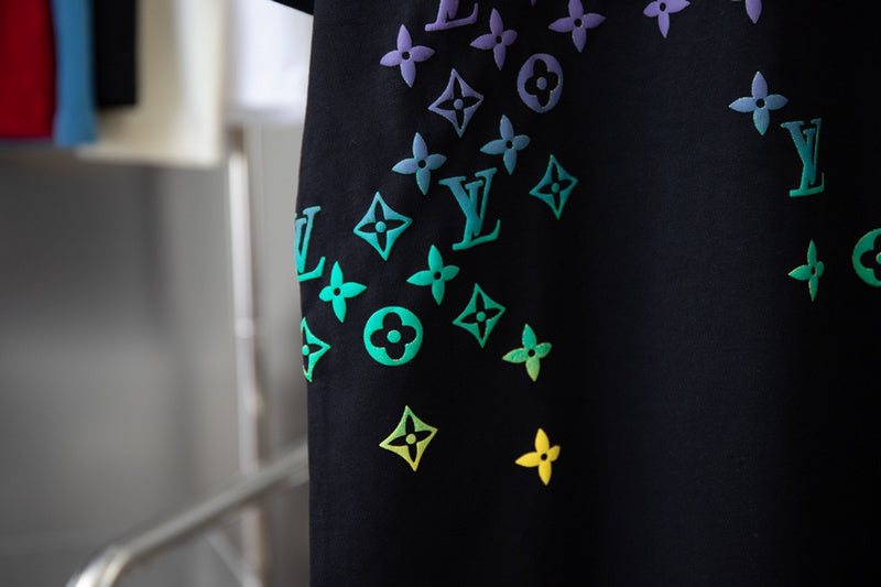 Flat lay presentation of Louis Vuitton cotton t-shirt with signature branding