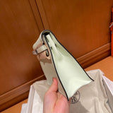 Side view of modern structured handbag