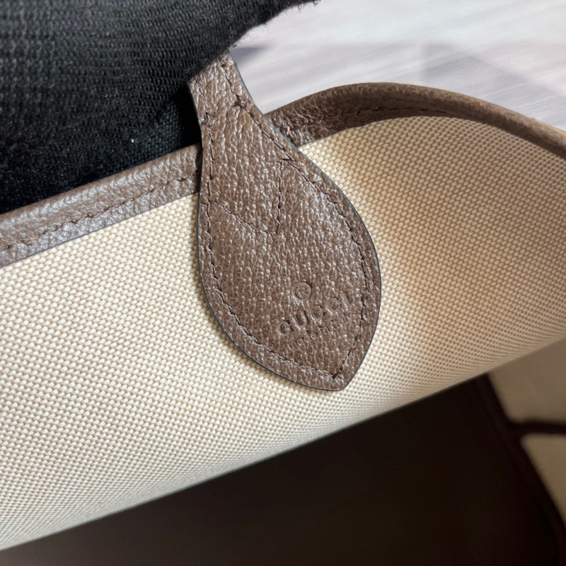 Side view of sleek structured handbag