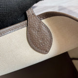 Side view of sleek structured handbag