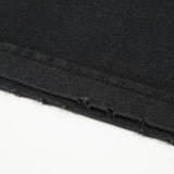 Close-up detail shot of Givenchy luxury clothing with signature branding