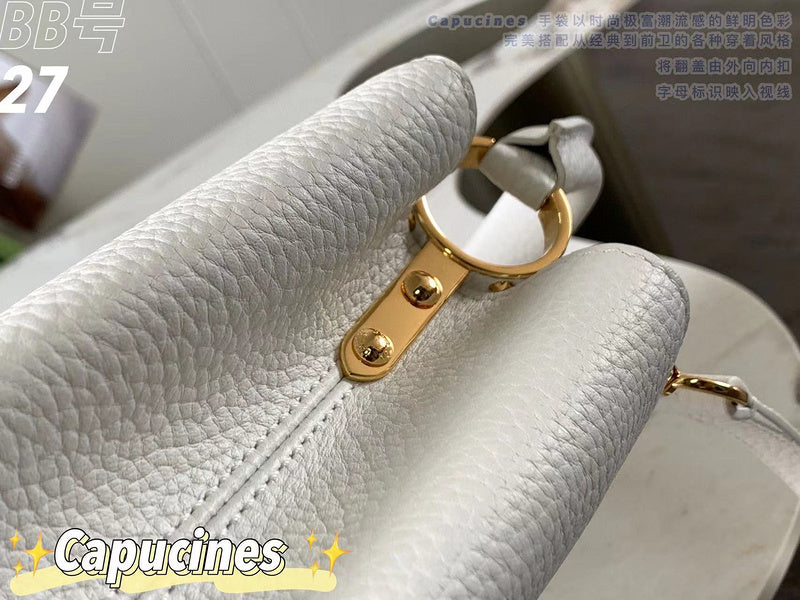 Handle and strap detail of structured refined women's handbag – women's designer-style accessory