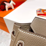 Side view of poised structured handbag