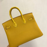 Side view of modern structured handbag